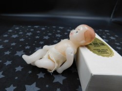 wax baby doll main side